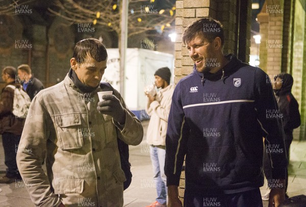 071215 - Cardiff Blues players feed the homeless on Charles Street, Cardiff -