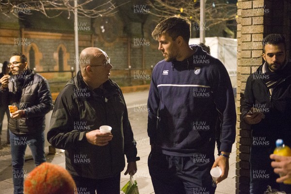 071215 - Cardiff Blues players feed the homeless on Charles Street, Cardiff -