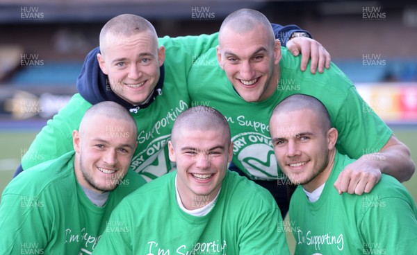 311213 - Cardiff Blues Charity Hair Shave -(L-R) Cory Allen, Owen Williams, Harry Robinson, Sam Warburton and Ellis Jenkins after having their heads shaved to raise money for Velindre in support of team Mattew Rees who is being treated for testicular cancer