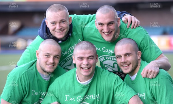 311213 - Cardiff Blues Charity Hair Shave -(L-R) Cory Allen, Owen Williams, Harry Robinson, Sam Warburton and Ellis Jenkins after having their heads shaved to raise money for Velindre in support of team Mattew Rees who is being treated for testicular cancer