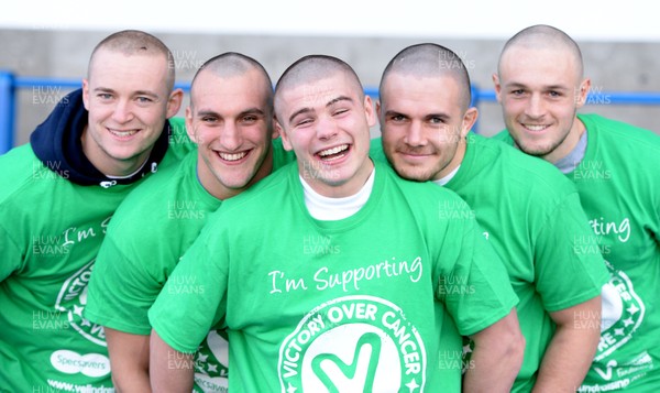 311213 - Cardiff Blues Charity Hair Shave -(L-R) Owen Williams, Sam Warburton, Harry Robinson, Ellis Jenkins and Cory Allen after having their heads shaved to raise money for Velindre in support of team Mattew Rees who is being treated for testicular cancer