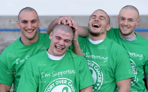 311213 - Cardiff Blues Charity Hair Shave -(L-R) Sam Warburton, Harry Robinson, Ellis Jenkins and Cory Allen after having their heads shaved to raise money for Velindre in support of team Mattew Rees who is being treated for testicular cancer