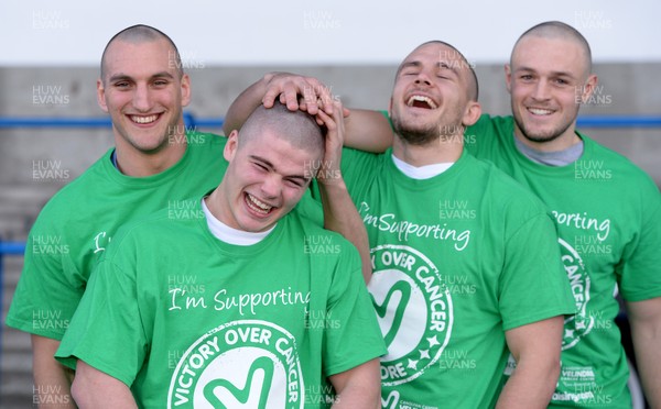 311213 - Cardiff Blues Charity Hair Shave -(L-R) Sam Warburton, Harry Robinson, Ellis Jenkins and Cory Allen after having their heads shaved to raise money for Velindre in support of team Mattew Rees who is being treated for testicular cancer