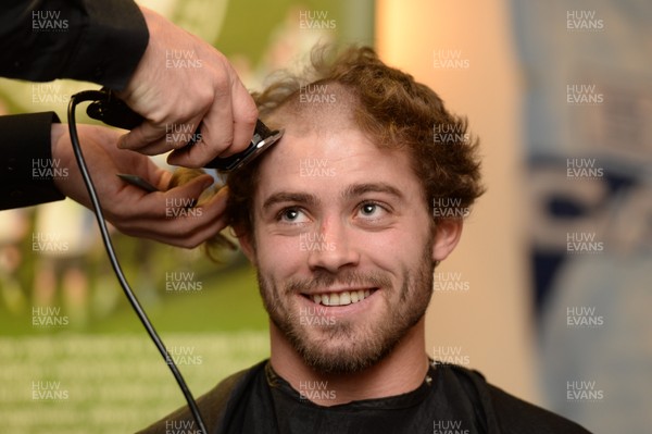 311213 - Cardiff Blues Charity Hair Shave -Leigh Halfpenny has his hair shaved off to raise money for Velindre in support of team Mattew Rees who is being treated for testicular cancer