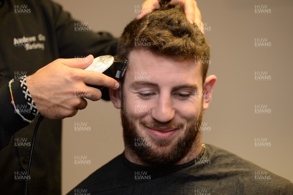 311213 - Cardiff Blues Charity Hair Shave -Alex Cuthbert has his hair shaved off to raise money for Velindre in support of team Mattew Rees who is being treated for testicular cancer