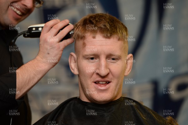 311213 - Cardiff Blues Charity Hair Shave -Bradley Davies has his hair shaved off to raise money for Velindre in support of team Mattew Rees who is being treated for testicular cancer