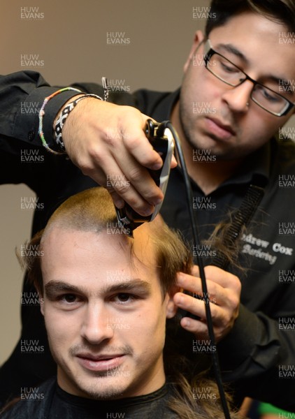 311213 - Cardiff Blues Charity Hair Shave -Chris Czekaj has his hair shaved off to raise money for Velindre in support of team Mattew Rees who is being treated for testicular cancer