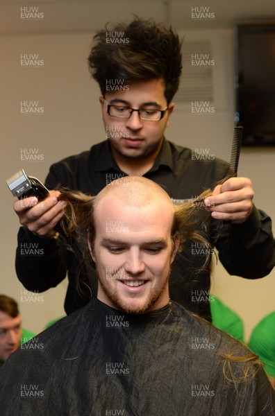 311213 - Cardiff Blues Charity Hair Shave -Kristian Dacey has his hair shaved off to raise money for Velindre in support of team Mattew Rees who is being treated for testicular cancer