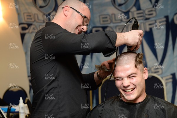 311213 - Cardiff Blues Charity Hair Shave -Harry Robinson has his hair shaved off to raise money for Velindre in support of team Mattew Rees who is being treated for testicular cancer