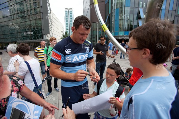 200713 - Cardiff Blues shirt launch - Cardiff Blues launch their new shirt for the 2013-14 season, with a flash mob dance routine outside Cardiff Library