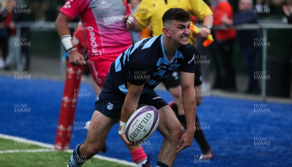 280621 - Cardiff Blues U18 v Dragons U18 - Amir Saleh of Cardiff Blues celebrates after he dives in to score try