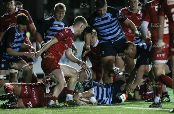 180220 - Cardiff Blues U18s v Scarlets U18, WRU U18 Regional Championship - Dylan Williams of Cardiff Blues reaches out to to score try