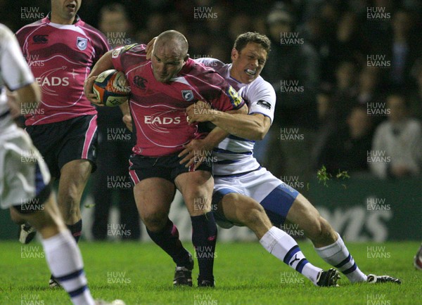 31.10.08 ... Cardiff Blues v Bath, EDF Energy Cup. -  Blues Gareth Williams is tackled by Baths Scott Bemand 