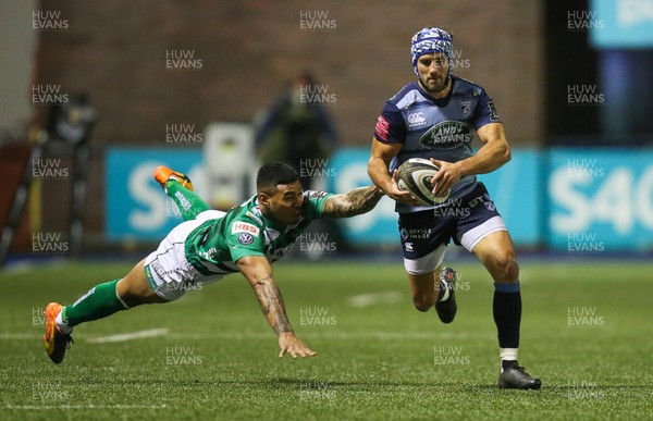 160318 - Cardiff Blues v Benetton Rugby, Guinness PRO14 - Matthew Morgan of Cardiff Blues gets away from Monty Ioane of Benetton Rugby