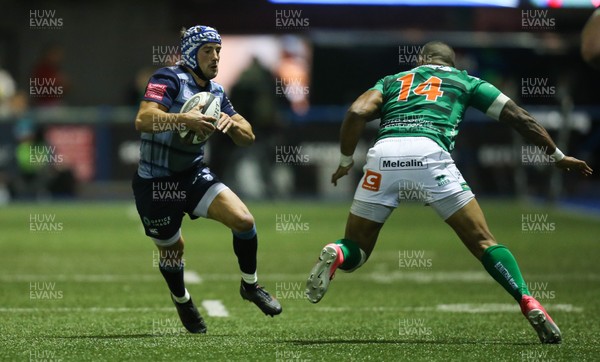 160318 - Cardiff Blues v Benetton Rugby, Guinness PRO14 - Matthew Morgan of Cardiff Blues is tackled by Michael Tagicakibau of Benetton Rugby