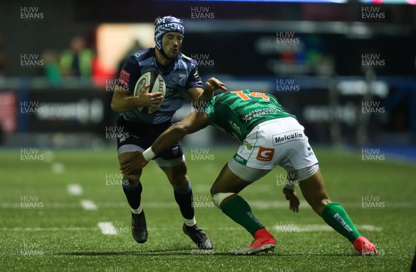 160318 - Cardiff Blues v Benetton Rugby, Guinness PRO14 - Matthew Morgan of Cardiff Blues is tackled by Michael Tagicakibau of Benetton Rugby