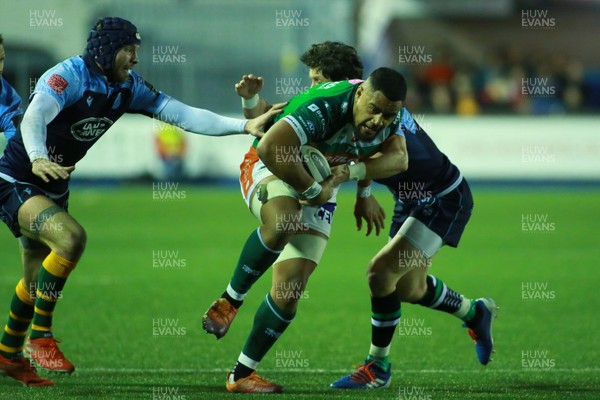 230220 - Cardiff Blues v Benetton Rugby - GuinnessPRO14 - Tao Halafihi of Benetton Rugby powers through Ryan Edwards(L) and Lloyd Williams of Cardiff Blues to score 