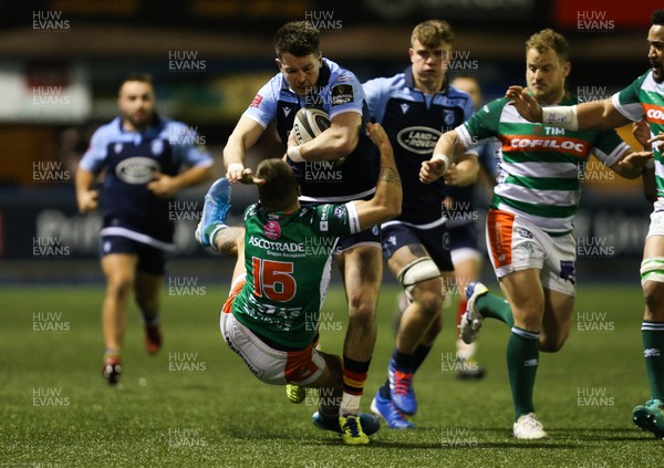 230220 - Cardiff Blues v Benetton Rugby, Guinness PRO14 - Jason Harries of Cardiff Blues charges through Luca Sperandio of Benetton Rugby