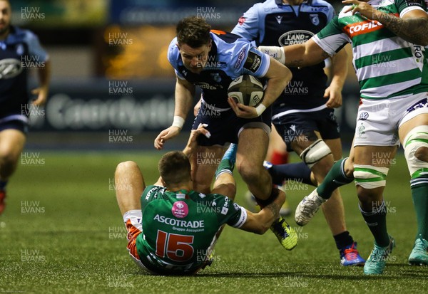 230220 - Cardiff Blues v Benetton Rugby, Guinness PRO14 - Jason Harries of Cardiff Blues charges through Luca Sperandio of Benetton Rugby