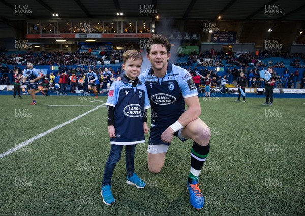 230220 - Cardiff Blues v Benetton Rugby, Guinness PRO14 - Match mascot with Lloyd Williams of Cardiff Blues