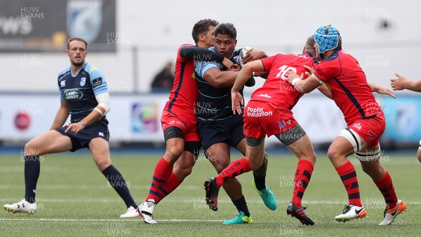 200816 - Cardiff Blues v Bristol Rugby - Pre Season Friendly - Nick Williams of Cardiff Blues is tackled by Gavin Henson and Adrian Jarvis of Bristol Rugby