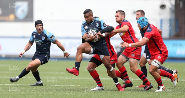 200816 - Cardiff Blues v Bristol Rugby - Pre Season Friendly - Rey Lee Lo of Cardiff Blues is tackled by Gavin Henson and Adrian Jarvis of Bristol Rugby