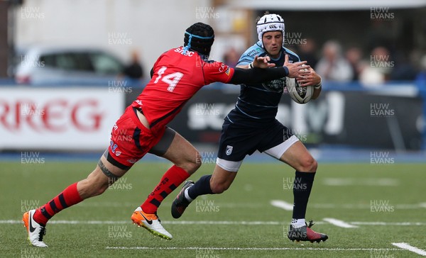 200816 - Cardiff Blues v Bristol Rugby - Pre Season Friendly - Matthew Morgan of Cardiff Blues is tackled by Ryan Edwards of Bristol Rugby