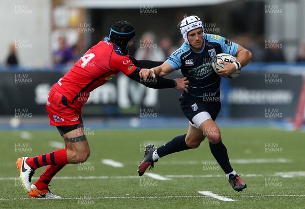 200816 - Cardiff Blues v Bristol Rugby - Pre Season Friendly - Matthew Morgan of Cardiff Blues is tackled by Ryan Edwards of Bristol Rugby