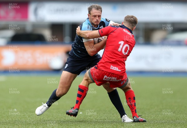 200816 - Cardiff Blues v Bristol Rugby - Pre Season Friendly - Cory Allen of Cardiff Blues is tackled by Adrian Jarvis of Bristol Rugby