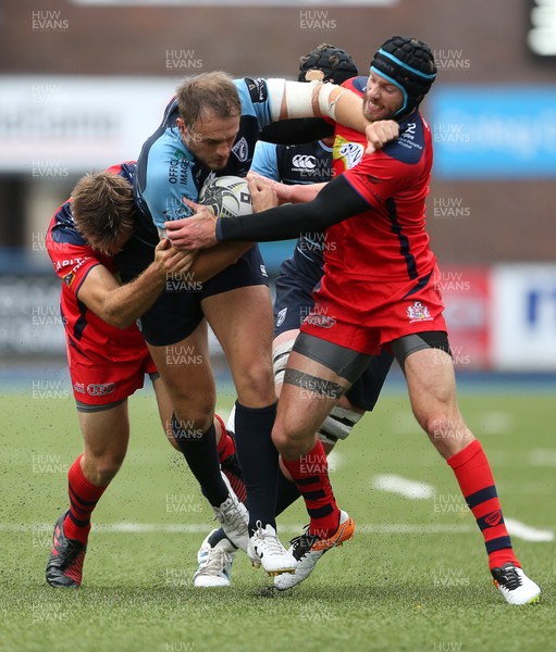 200816 - Cardiff Blues v Bristol Rugby - Pre Season Friendly - Cory Allen of Cardiff Blues is tackled by Adrian Jarvis and Ryan Edwards of Bristol Rugby