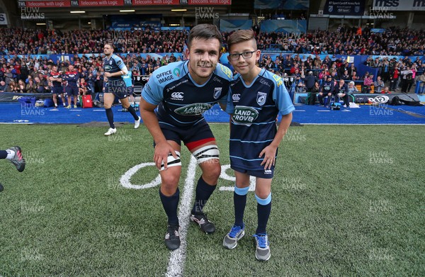 200816 - Cardiff Blues v Bristol Rugby - Pre Season Friendly - Ellis Jenkins of Cardiff Blues walks out with the mascot