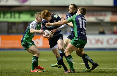 060315 - Cardiff Blues v Connacht - Guinness PRO12 -Rhys Patchell of Cardiff Blues is tackled by John Cooney and Craig Ronaldson of Connacht