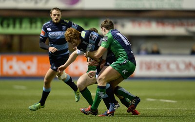 060315 - Cardiff Blues v Connacht - Guinness PRO12 -Rhys Patchell of Cardiff Blues is tackled by John Cooney and Craig Ronaldson of Connacht