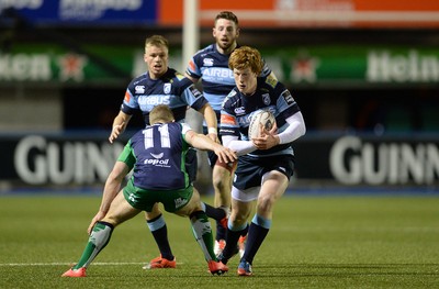 060315 - Cardiff Blues v Connacht - Guinness PRO12 -Rhys Patchell of Cardiff Blues is tackled by Matt Healy of Connacht