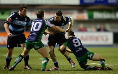 060315 - Cardiff Blues v Connacht - Guinness PRO12 -Alex Cuthbert of Cardiff Blues is tackled by Craig Ronaldson and John Cooney of Connacht