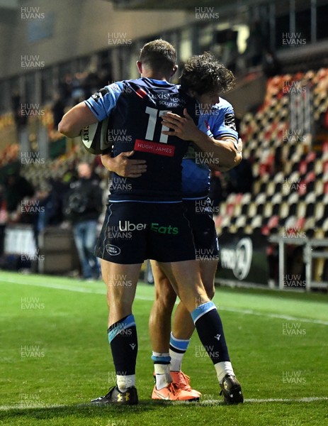 101020 - Cardiff Blues v Connacht - Guinness PRO14 - Hallam Amos of Cardiff Blues celebrates scoring try with Lloyd Williams (right)