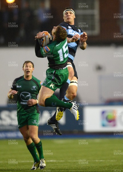 130913 - Cardiff Blues v Connacht - RaboDirect PRO12 -Robin Copeland of Cardiff Blues and Gavin Duffy of Connacht compete for high ball