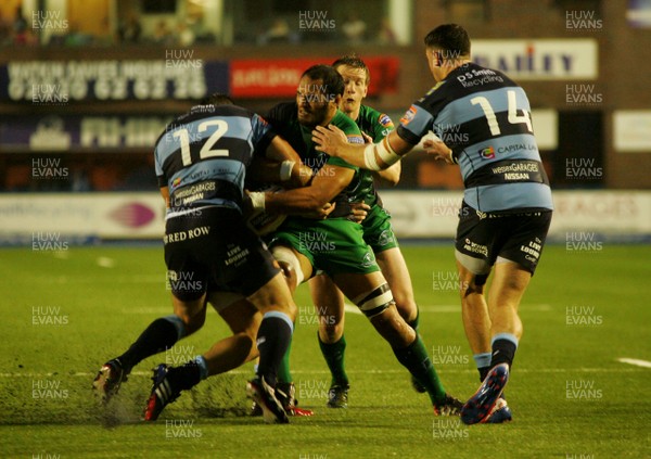 130913 Cardiff Blues v Connacht - RaboDirectPro12 -Connacht's George Nauoppau is tackled by Blues' Dafydd Hewitt(12) and Tom Williams(hidden)