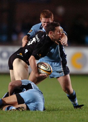 18.11.06  Cardiff Blues v Connacht Connachts Daniel Riordan is tackled by Duane Goodfield and Marc Stcherbina 