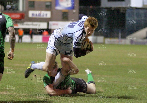 220213 Cardiff Blues v Connacht - RaboDirectPro12 -Blues' Rhys Patchell is tackled by Connacht's Eion Griffin 