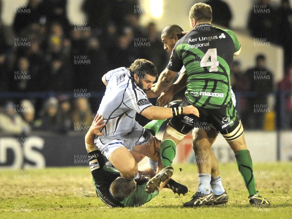 220213 - Cardiff Blues v Connacht - RaboDirect PRO12 - Benoit Bourrust of Cardiff Blues,is tackled by Connacht's Nathan White 