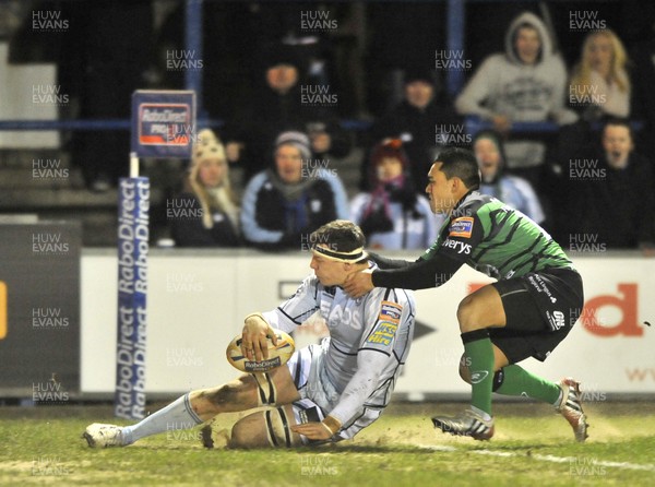 220213 - Cardiff Blues v Connacht - RaboDirect PRO12 - Robin Copeland of Cardiff Blues scores despite the tackle of Connacht's Miah Nikora  