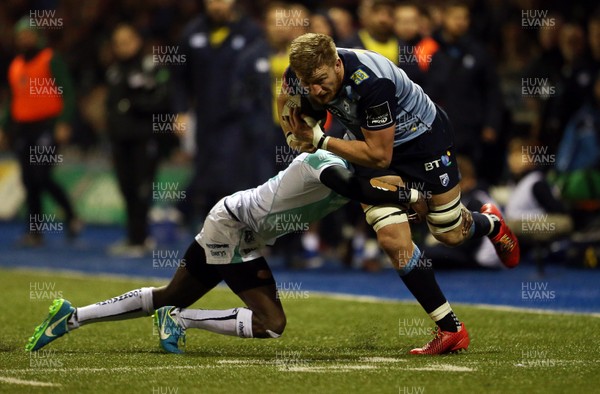 241117 - Cardiff Blues v Connacht - Guinness PRO14 - Macauley Cook of Cardiff Blues is tackled by Niyi Adeolokun of Connacht