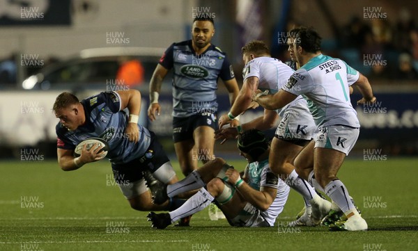 241117 - Cardiff Blues v Connacht - Guinness PRO14 - Corey Domachowski of Cardiff Blues is tackled by John Muldoon of Connacht