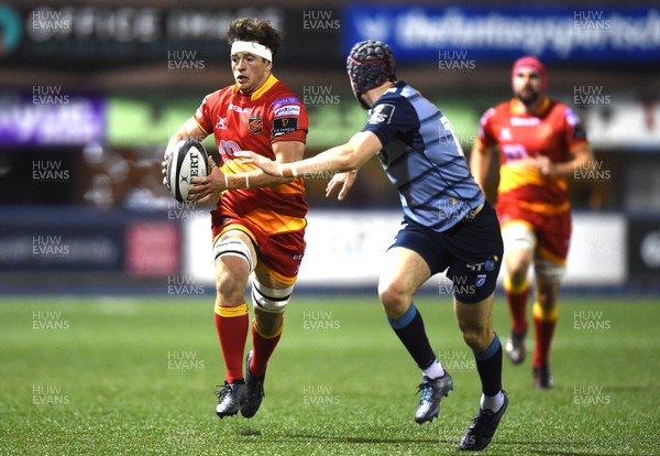 061017 - Cardiff Blues v Dragons Rugby - Guinness PRO14 - James Benjamin of Dragons looks for a way past Rhun Williams of Cardiff Blues