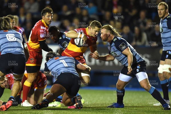 061017 - Cardiff Blues v Dragons Rugby - Guinness PRO14 - Hallam Amos of Dragons is tackled by Brad Thyer of Cardiff Blues