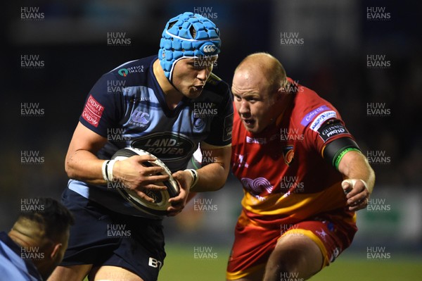 061017 - Cardiff Blues v Dragons Rugby - Guinness PRO14 - Olly Robinson of Cardiff Blues gets past Brok Harris of Dragons