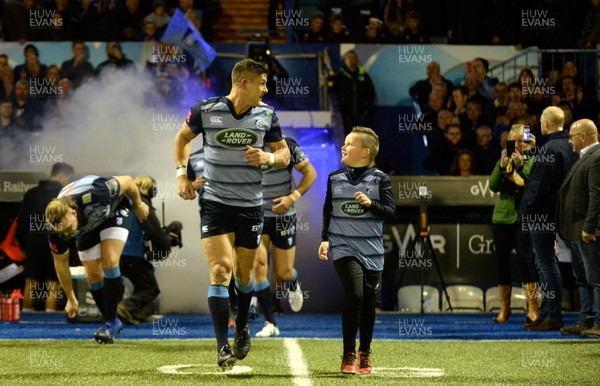 061017 - Cardiff Blues v Dragons Rugby - Guinness PRO14 - Lloyd Williams of Cardiff Blues leads out his side with mascot