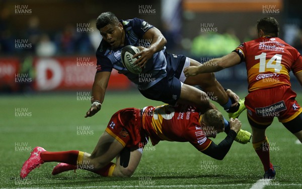 061017 - Cardiff Blues v Dragons Rugby - Guinness PRO14 - Nick Williams of Cardiff Blues is tackled by Jack Dixon of Dragons