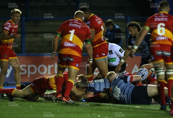 061017 - Cardiff Blues v Dragons Rugby - Guinness PRO14 - Kristian Dacey of Cardiff Blues pushes over to score a try